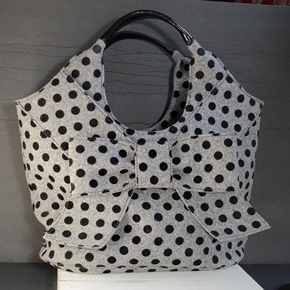 Light Pale Grey Even Dark Polka Dot Soft Curved Shoulder Tote With Oversized Layered Front Bow And Smooth Dark Oval Carry Grips