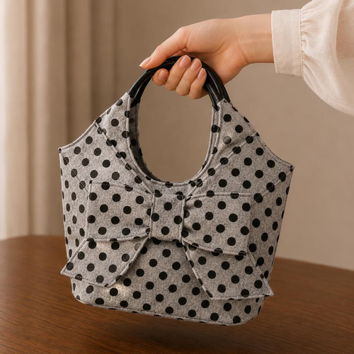 Light Pale Grey Even Dark Polka Dot Soft Curved Shoulder Tote With Oversized Layered Front Bow And Smooth Dark Oval Carry Grips